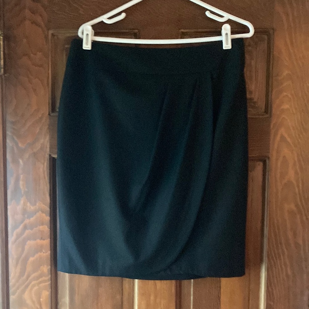 The Limited. Black Skirt with draping in the front. Tulip. Size 10. Lined.
